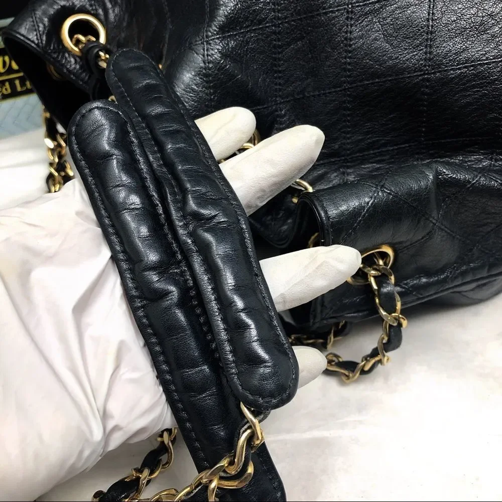 Vintage Chanel Black Lambskin Quilted CC Drawstring Bucket Bag Leather Backpack
